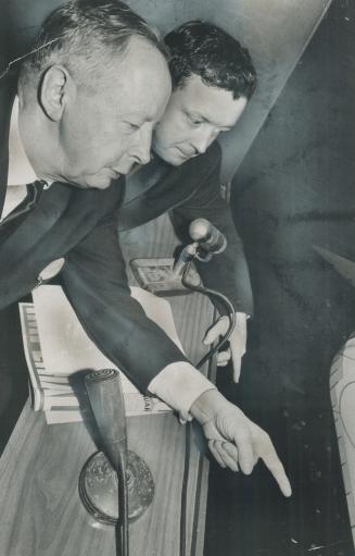 Foster Hewitt, in foreground, and son Bill are at home in the gondola in Gardens