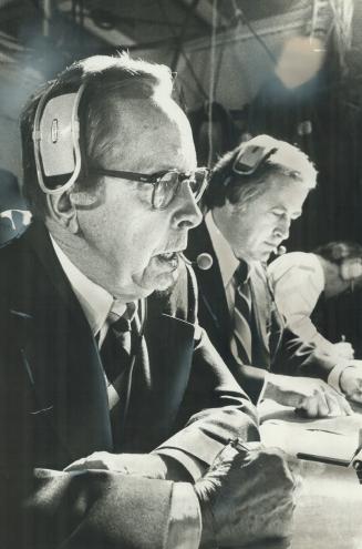Foster Hewitt, with Brian McFarlane, surveys Gardens action