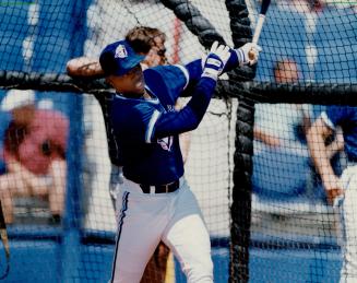 Re-armed and dangerous: Glenallen Hill, who took a few swings in his sleep at some spiders, is back in Jays lineup and ready to take his cuts at the plate