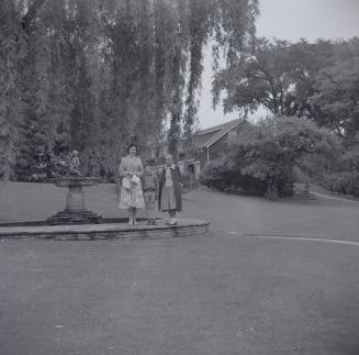 Image shows a few family members posing for a photo at the Edward Gardens.