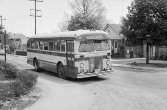 Roseland Bus Lines, bus #38, on East Drive, looking southeast from Bexley Crescent