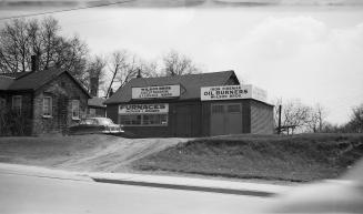 Wilson Bros., tinsmiths, Dundas Street West, south side, east of Gooch Avenue, Toronto, Ontario