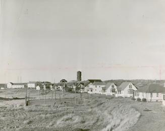 Model Village of Abitibi Canyon provides workers with a four-room bungalow for $14
