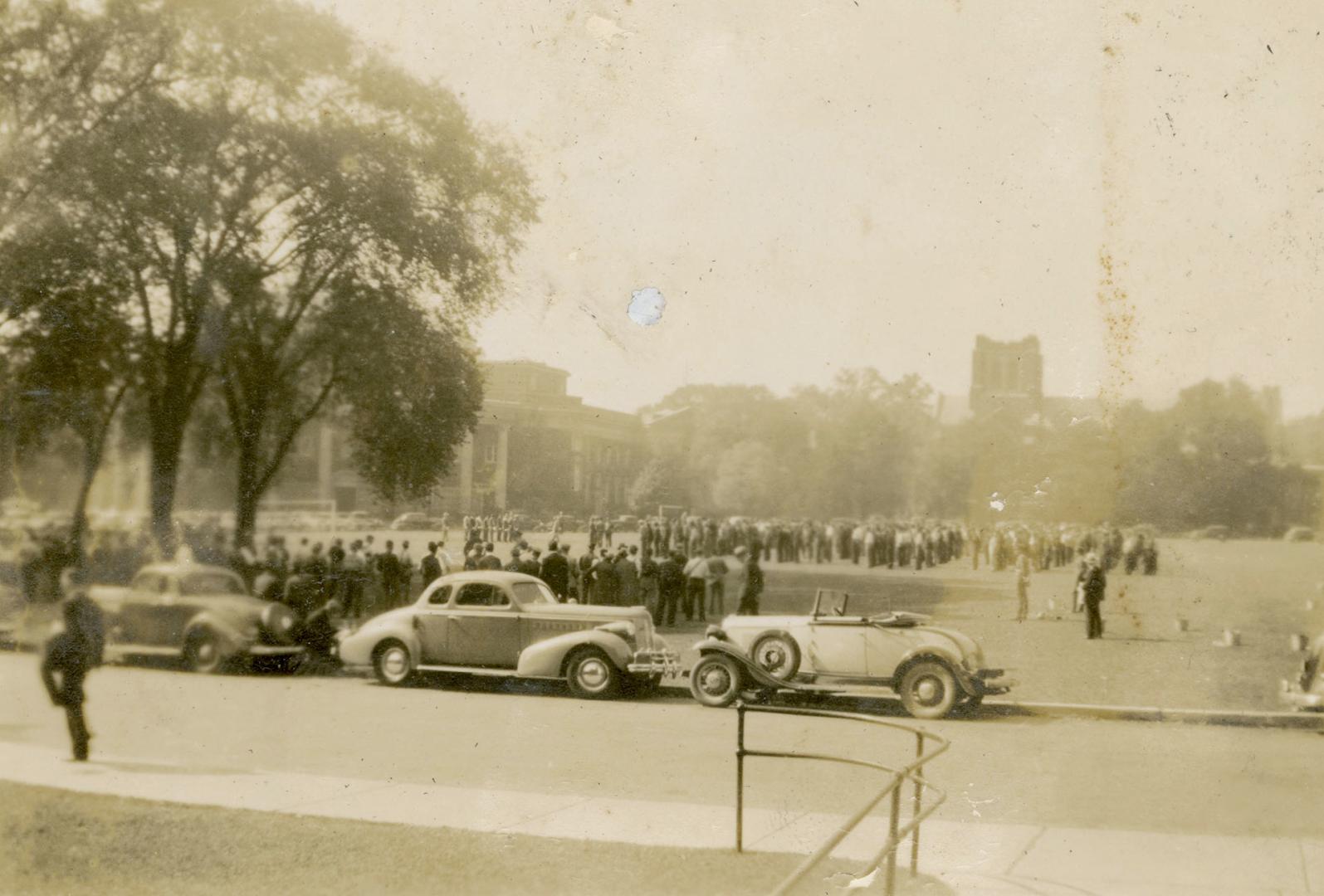 The army on the University of Toronto campus, gas masks in foreground