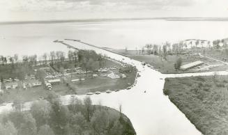 Harbor and breakwater of Lagoon City, on Lake Simcoe near Brechin, are shown in this aerial photograph during the opening ceremonies