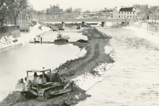 Mammoth task: Containing the Grand River that dissects the city of Cambridge became a matter of necessity after a fourth major flood in 100 years left hundreds homeless in 1974