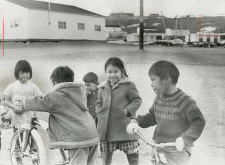 Playing in the street in Frobisher Bay