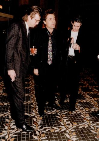 Actor (left) C. David Johnson Art Hindle