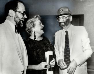 Fiery Leader: John Hirsch (in baseball cap) with Brian Macdonald and Maureen Forrester at a Stratford opening in 1984