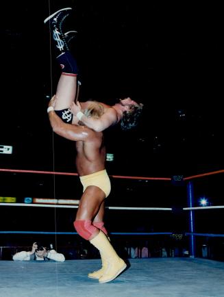Hulk is shown here dispatching DiBiase in a tag-team match at the Gardens