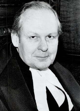 Inquiry duty: Justice Lloyd Houlden: left: of Ontario court of Appeal and Ontario Associate Chief Justice Charles Dubin are conducting judicial probes