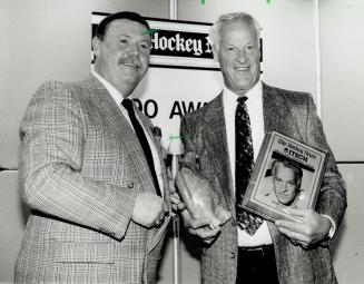 He's a winner: and Howe: The legend: Gordie Howe: picked up his share of hardware at the Hockey News luncheon: winning the King Clancy award