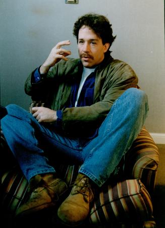 Wearing heavy lumberjack boots and faded jeans for interview: Tom Hulce might have passed for your basic northern hoser, writer reports
