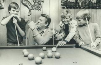 Tommy Hunter relaxes at home with his wife, Shirley and sons (from left) Greg 11, Jeff 13, and Mark 9