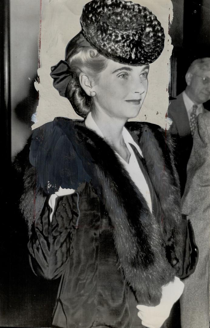 Barbara Hutton: thrice-wed dime store heiress, is being sworn here as she prepares to give evidence which won her an uncontested divorce from Cary Grant, the actor