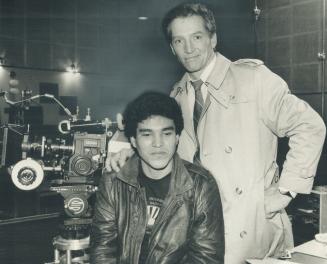 Night warmth: Salvadoran refugee Jose Vasquez finds a new friend in actor Scott Hylands (right) and other crew members of Night Heat, who rescued him from the cold streets