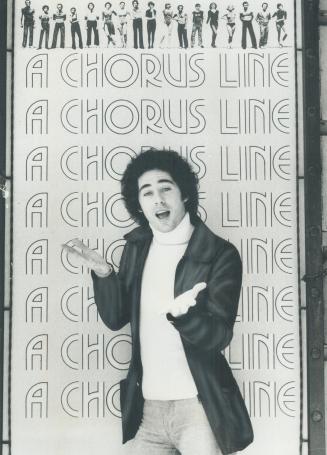 An Impromptu display from Jeff Hyslop in front of the Royal Alexandra Theatre's billboard shows how happy the young dancer feels to be back with the c(...)
