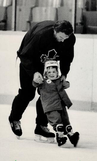 A budding Leaf star made his debut at Maple Leaf Gardens yesterday when Toronto centre Peter Ihnacak took his 2 1/2-year-old son, Brian, for his first skate. [Incomplete]