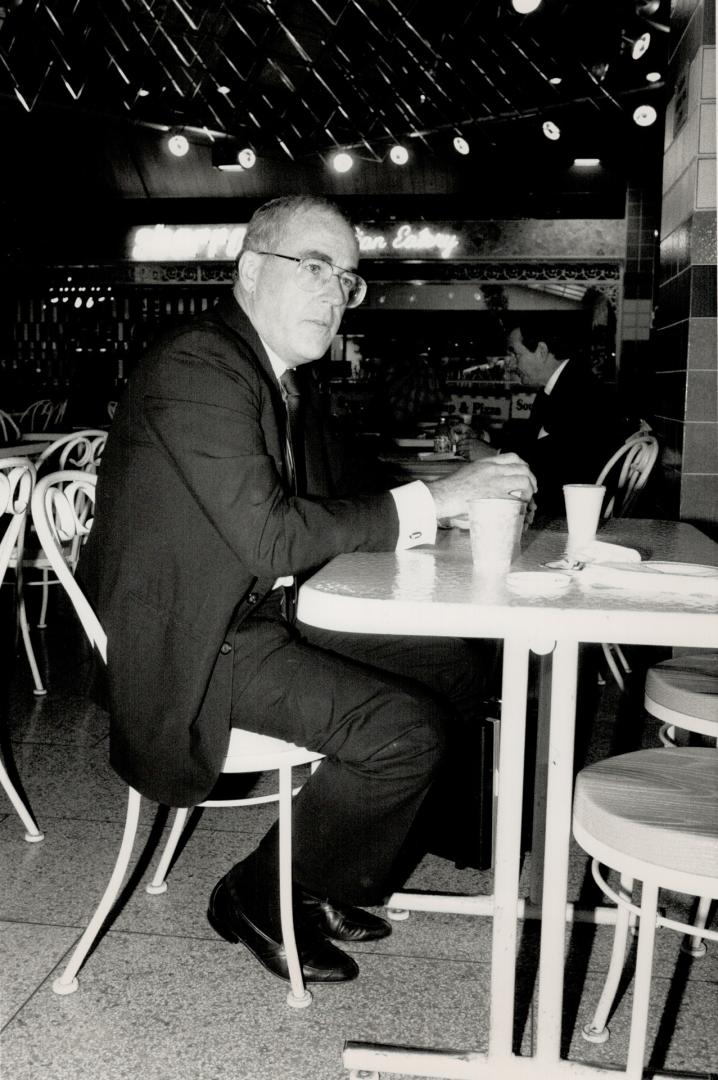 On trial: Kirby Inwood stops for a cup a coffee before heading into the College Park courthouse yesterday