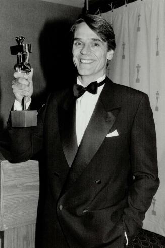 Jeremy Irons: named best actor for his role in the movie Dead Ringers: shows off his trophy at the awards ceremony at the Harbour Castle Westin last night