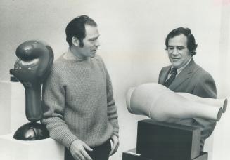 Dismembered Parts of the female body lay around the Isaacs Gallery when sculptor John Ivor Smith (left) talked with gallery owner Av Isaacs at the Ope(...)