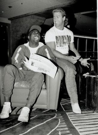 Big news is good news: At least Raghib (Rocket) Ismail: left: and Argonaut QB Matt Dunigan think so as they read The Star's sports section in the lobby of the SkyDome hotel yesterday