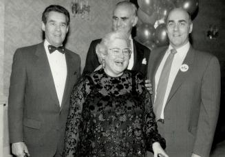 Left, Nancy Rowell Jackman surrounded by her brothers, left to right, Dr. Eric Jackman