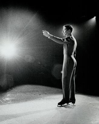Don Jackson takes a bow at the end of his performance with the ice follies