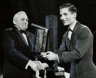 Don Jackson receives 1962 Lou Marsh trophy at gardens
