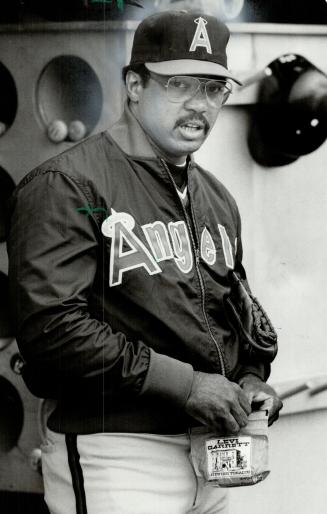 Pro and con, Reggie Jackson of the Angels, left, says baseball this season is juiced up, while Damaso Garcia of Jays disagrees