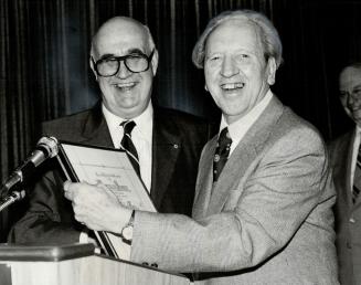 Former Star photgrapher Norman James, Received his Canadian News Hall of Fame citation from Lieutenant-governor John Black Aird at the Toronto Press Club