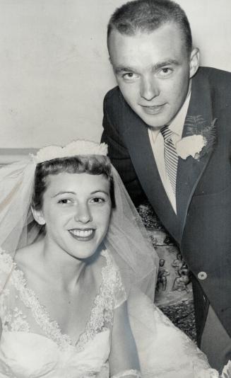 Mr. and Mrs. Robert William Miller are seen after their marriage in Victoria Square United church