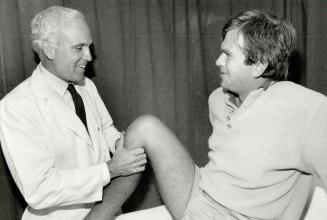 Back to the slopes, Dr. Peter James of the Orthopedic and Arthritic Hospital is happy with the results of surgery on ski instructor Fred Bilton's knee(...)