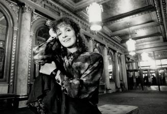 Historic photo from Tuesday, December 12, 1989 - Elgin and Winter Garden Theatres - Wizard of Oz designer Astrid Janson in the lobby in Garden District