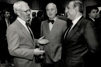 Above, director of Slaves Of New York James Ivory, centre, the film's producer Ismail Merchant, right, and Canada's Norman Jewison, left