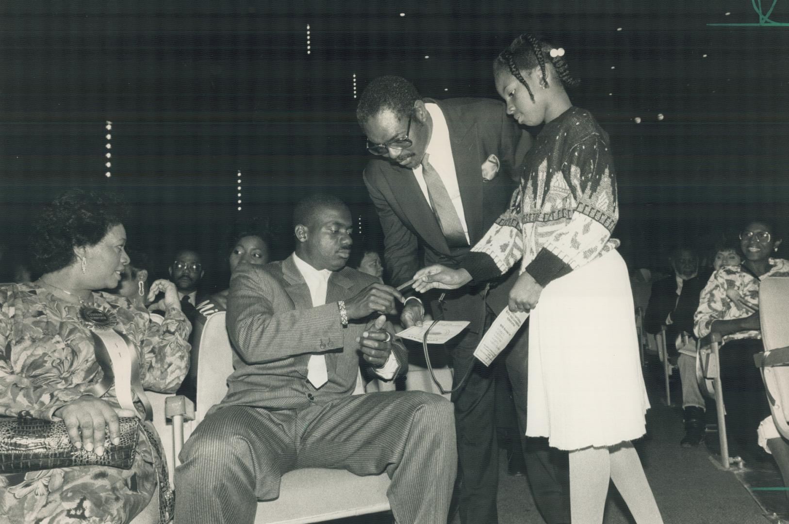 Ben and fans: Ben Johnson signs autographs last night at the Canadian Black Achievement Awards, where he was honored for his contribution to sports