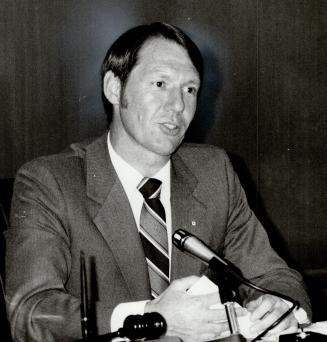 Wondering: East York's Dave Johnson, left, North York's Bob Yuill question financing
