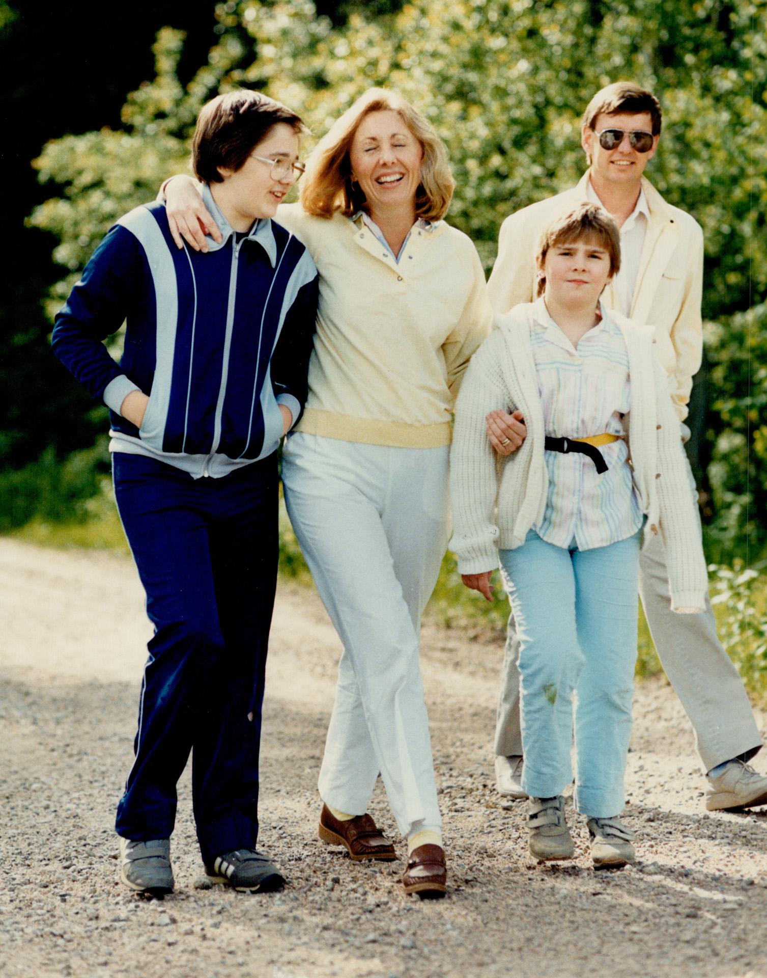 Just ordinary folks: The Johnston clan -- son Aaron, Lynn, daughter Katie and husband Rod 