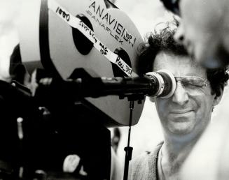 Director Claude Jutra lines up a shot