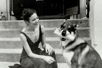 Getting to know you Popular ballerina Karen Kain gets to know Hobo, star of TV's The Littlest Hobo, on steps of the National Ballet School on Maitland(...)