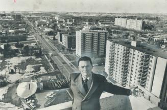 Ignat Kaneff stands atop his 22-storey-high Mississauga Towers apartment building in Cooksville against a backdrop of apartments, many of which he has(...)