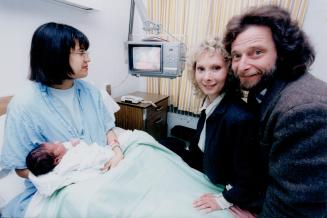 Kathy Kastner. Marvin Berns (right), Karla Smith-Mitchell and Marcus (baby)