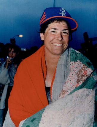 Wrapped in a quilt for warmth, Vicki Keith was glowing with happiness as well today after becoming the first person to swim across Lake Huron. At time(...)