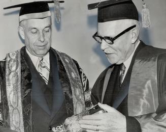 Prime minister St. Laurent received an honorary doctorate of laws when he attended a McMaster university convocation last night. Mr. St. Laurent also (...)