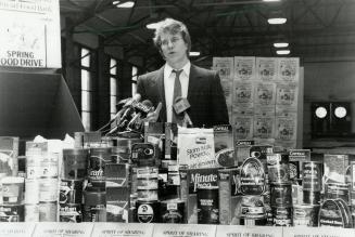 Spirit of sharing: Gerard Kennedy, director of the Daily Bread Food Bank, stresses the urgent need as he launches the Easter food drive yesterday