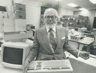 Abundance: University of Waterloo president Doug Wright doesn't know where to put all the computers donated by Ditigal Equipment