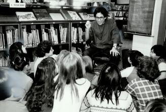 Oral magic: Storyteller Dan Yashinsky holds a group of Kensington Community School children in his spell as he tells them a story