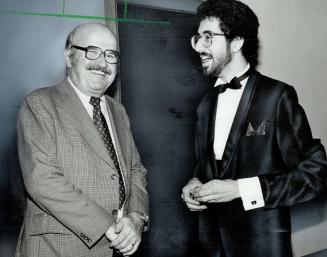 The hero of Saturday night, Elwy Yost of TVOntario, above left, chats with Joel Green, a feature film distributor