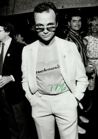 CITY-TV President Moses Znaimer wears white suit he says cost him $20 on the French Riviera