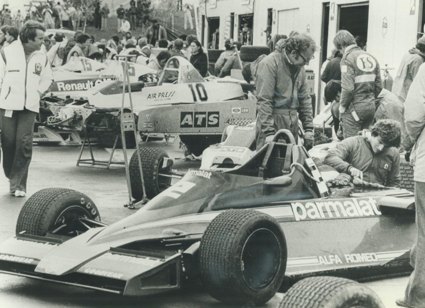 Pit activity around John Watson's Brabham Alfa Romeo is frantic during qualifying session at Montral Grand Prix yesterday